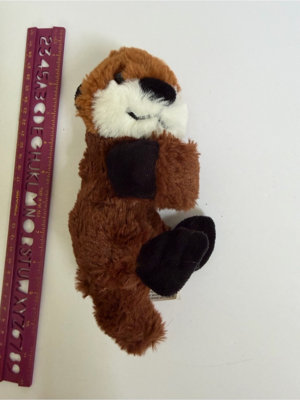 Wild Republic Huggers River Otter slap-bracelet plush.